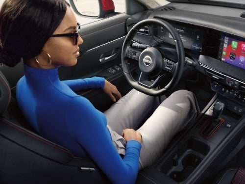 2025 Nissan Kicks view of woman in front driver seat